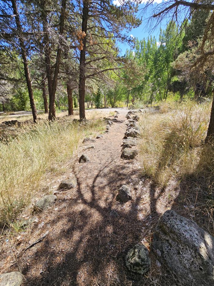A campground footpathA rock-lined footpath in Chukar Park Campground.