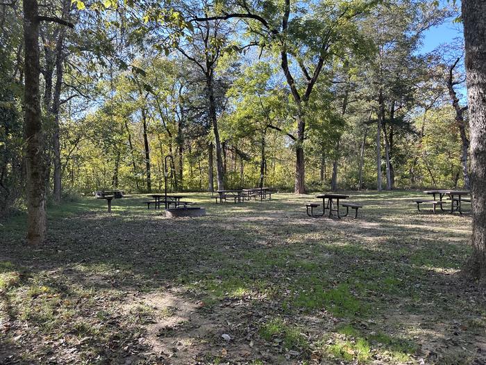 A photo of Site G02 of Loop Alley Spring Group Sites at ALLEY SPRING with Picnic Table, Fire Pit, Shade, Lantern Pole