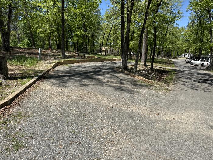 A photo of Site 04 of Loop A at Crystal Springs (AR) with Picnic Table, Electricity Hookup, Fire Pit, Waterfront