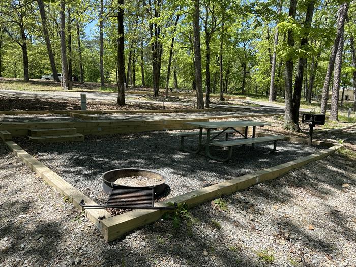 A photo of Site 05 of Loop A at Crystal Springs (AR) with Picnic Table, Fire Pit