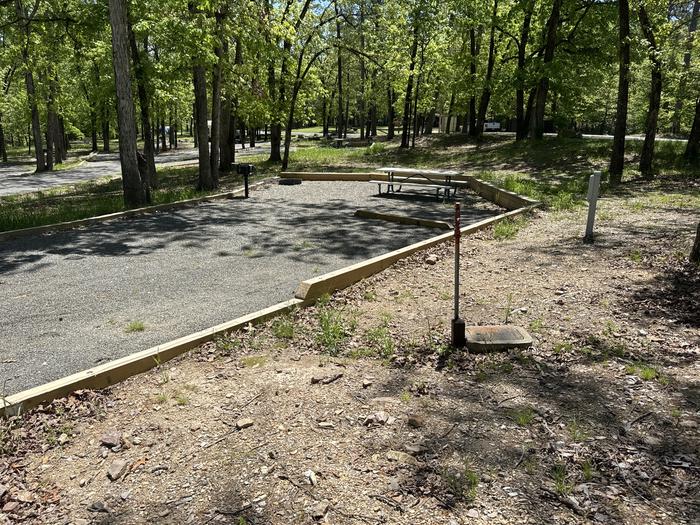 A photo of Site 08 of Loop A at Crystal Springs (AR) with Electricity Hookup, Fire Pit, Water Hookup