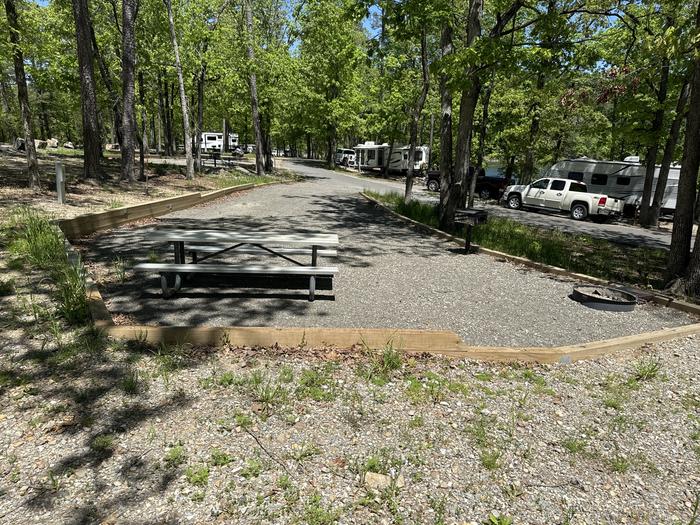 A photo of Site 08 of Loop A at Crystal Springs (AR) with Picnic Table, Fire Pit