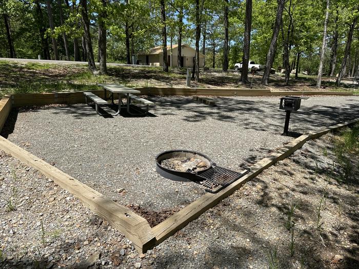A photo of Site 08 of Loop A at Crystal Springs (AR) with Picnic Table, Electricity Hookup, Fire Pit, Water Hookup