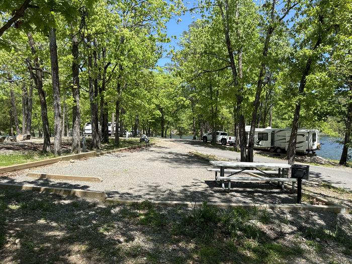 A photo of Site 10 of Loop A at Crystal Springs (AR) with Picnic Table, Fire Pit