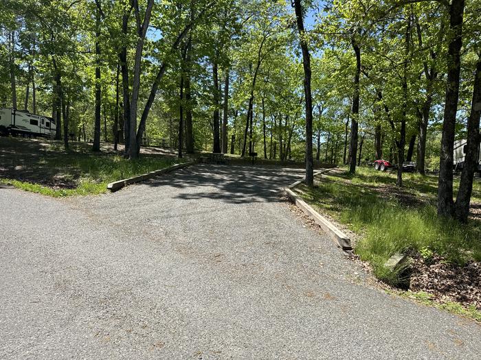 A photo of Site 14 of Loop A at Crystal Springs (AR) with Picnic Table, Electricity Hookup, Fire Pit, Water Hookup