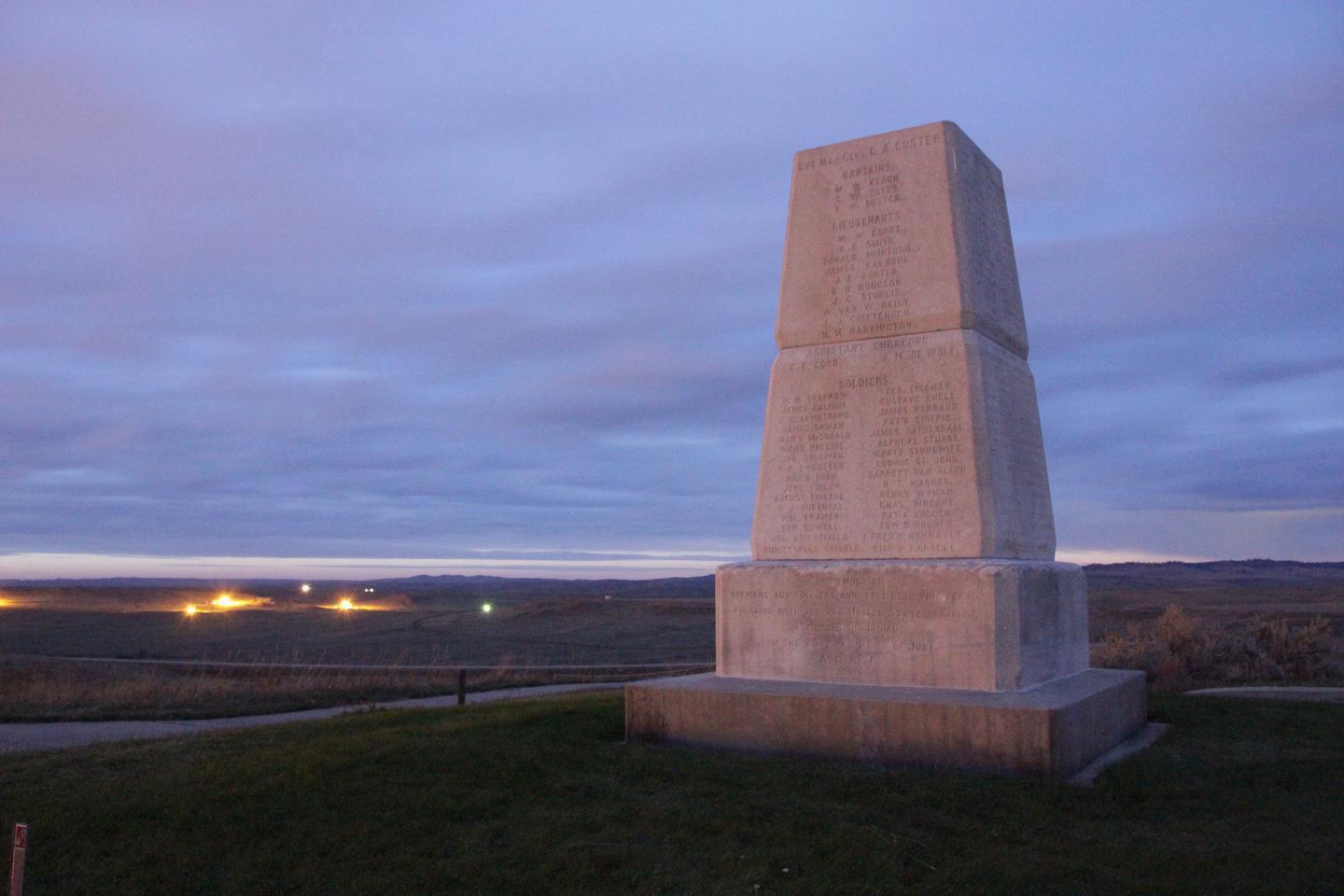 Seventh Calvary Memorial at DuskAbout 40 to 50 men of the original 210 were cornered on the hill where the monument now stands.