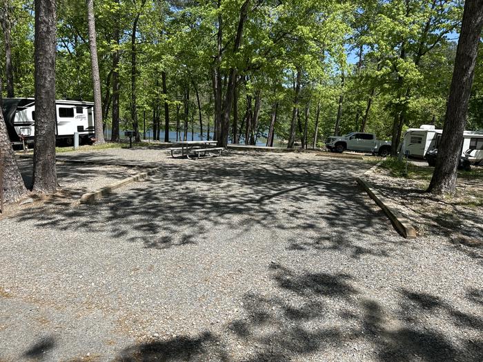 A photo of Site 21 of Loop A at Crystal Springs (AR) with Picnic Table, Electricity Hookup, Fire Pit, Water Hookup