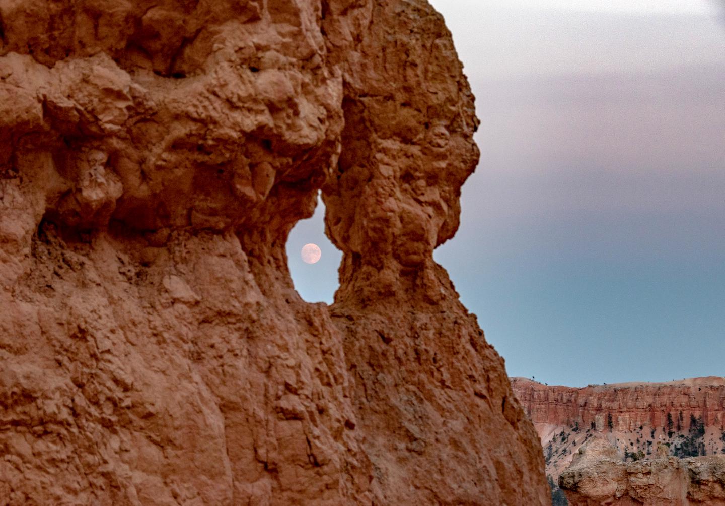 Full Moon RiseFull Moon through rock window