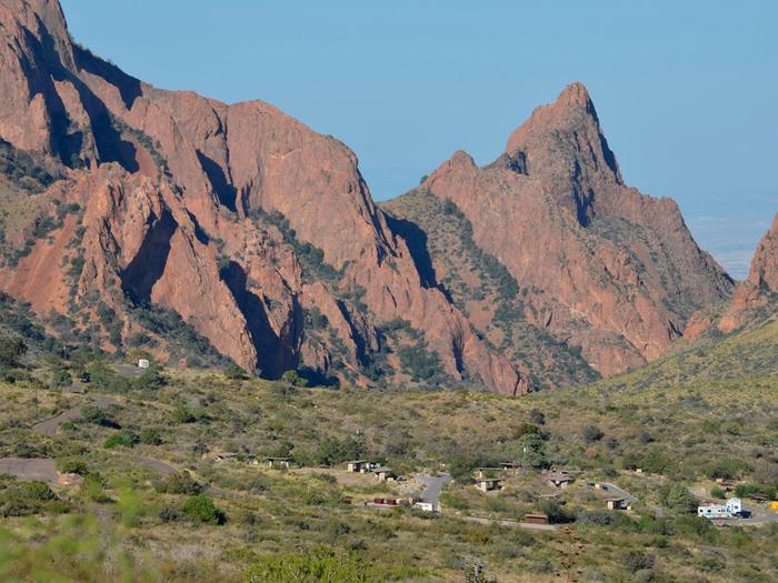 Chisos Basic Campground Area from a distance surrounded by mountain peaksGroup campground view from a distance