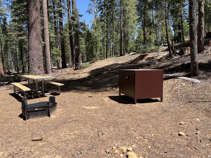 A photo of Site 528 of Loop 5 at Crane Flat Campground with Picnic Table, Fire Pit, Food Storage