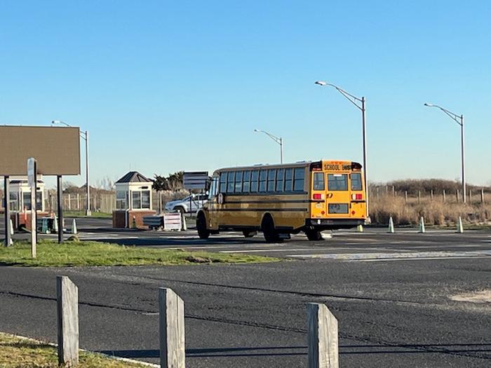 a yellow school bus (an example of an oversized vehicle)