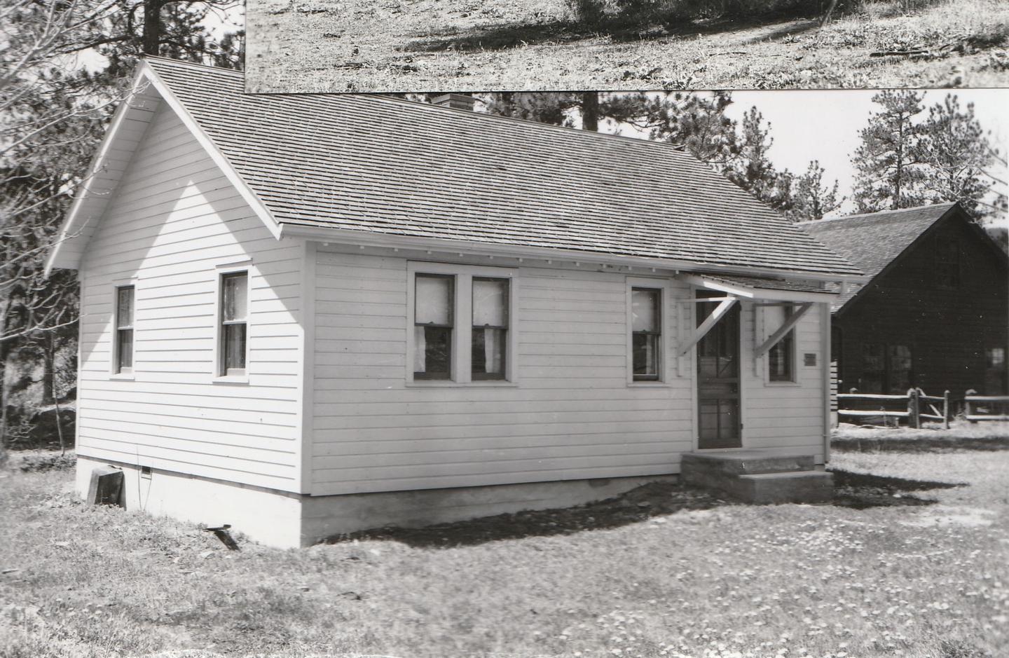 Black and white historic photo of the Buckhorn Assistant Ranger Cabin from 1950