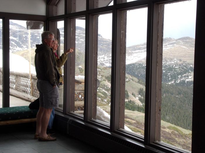 Looking Out from the Inside of Alpine Visitor CenterVisitors are enjoying scenic views while looking out the windows of Alpine Visitor Center