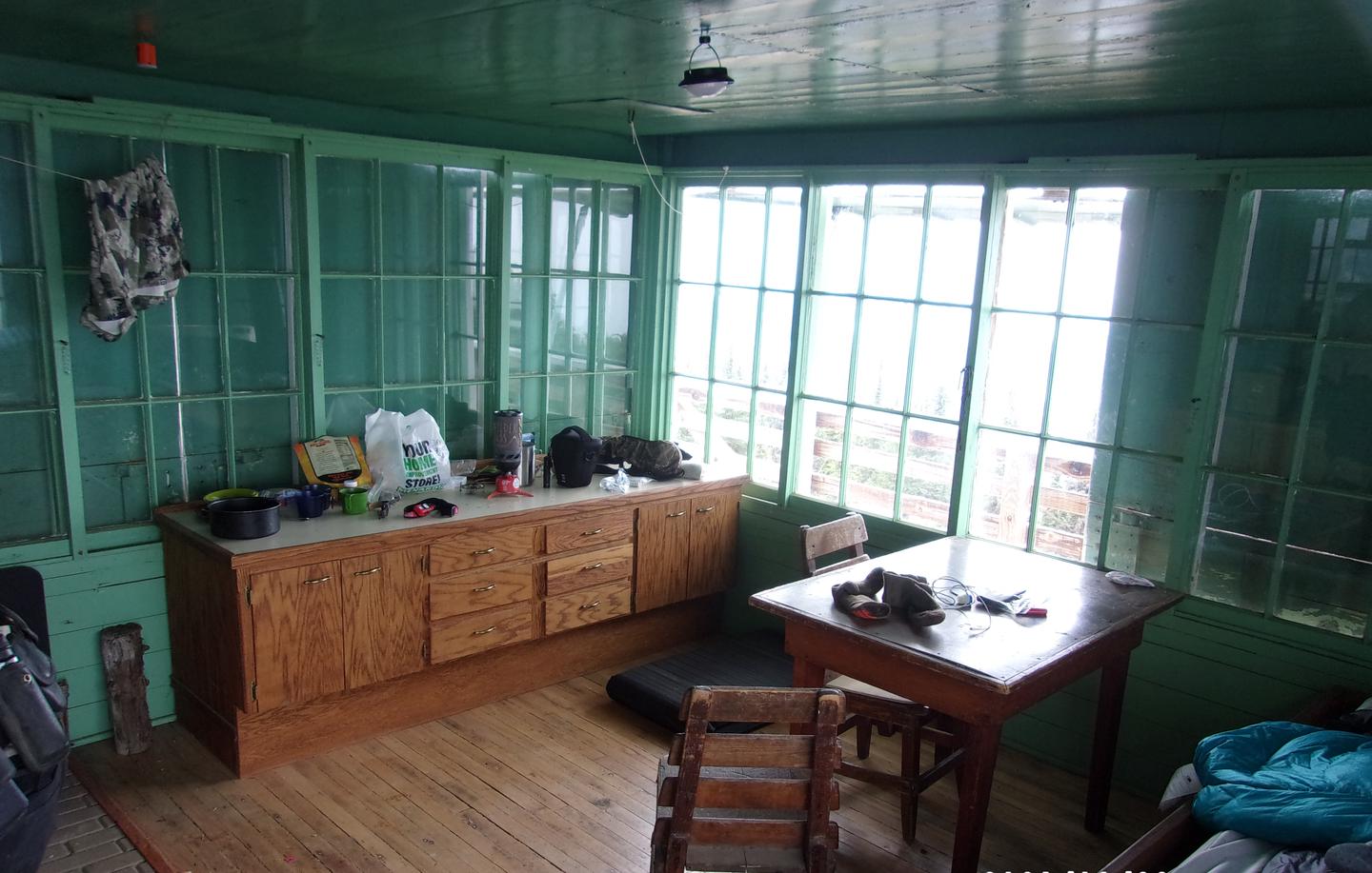 Looking into the Scurvy Mountain Lookout cab from the entry doorInterior of Scurvy Mountain Lookout cab