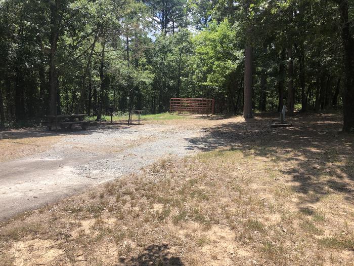 A photo of Site E001 of Loop HCLE at CEDAR LAKE (OKLAHOMA) with Picnic Table, Fire Pit, Lantern Pole, Water Hookup