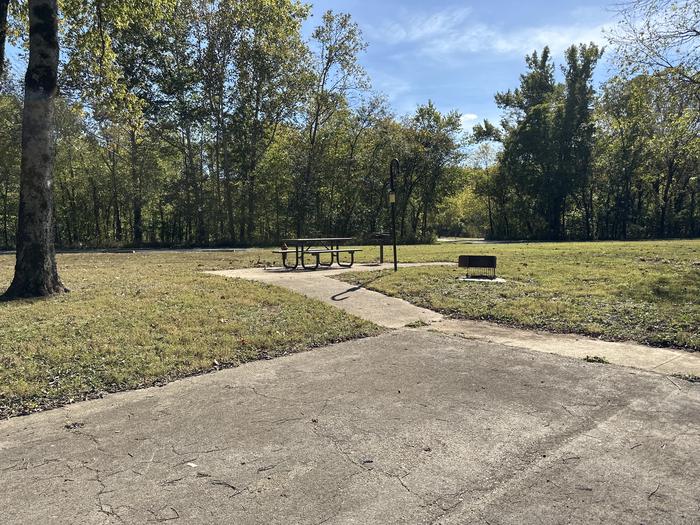 A photo of Site 512 of Loop Loop 500 at ALLEY SPRING with Picnic Table, Fire Pit, Lantern Pole