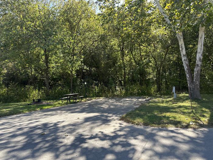 A photo of Site 612 of Loop Loop 600 at ALLEY SPRING with Picnic Table, Electricity Hookup, Fire Pit, Shade, Lantern Pole, Water Hookup