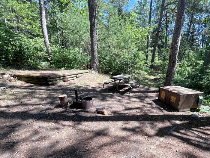 Site A tent pads, fire ring, picnic table, and bear lockers