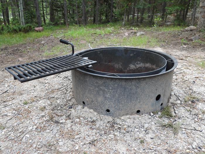 Fire RingsExample of the fire rings located throughout the campground (with grill)