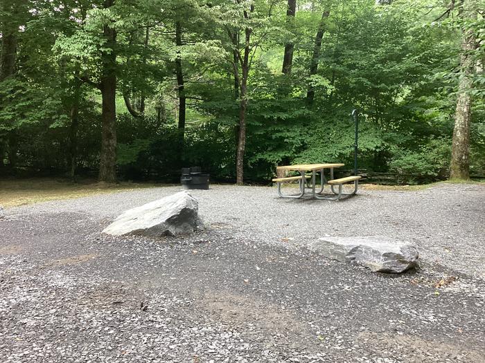 A photo of Site 003 of Loop River at BLACK MOUNTAIN CAMPGROUND with Picnic Table, Fire Pit, Shade, Waterfront, Lantern Pole