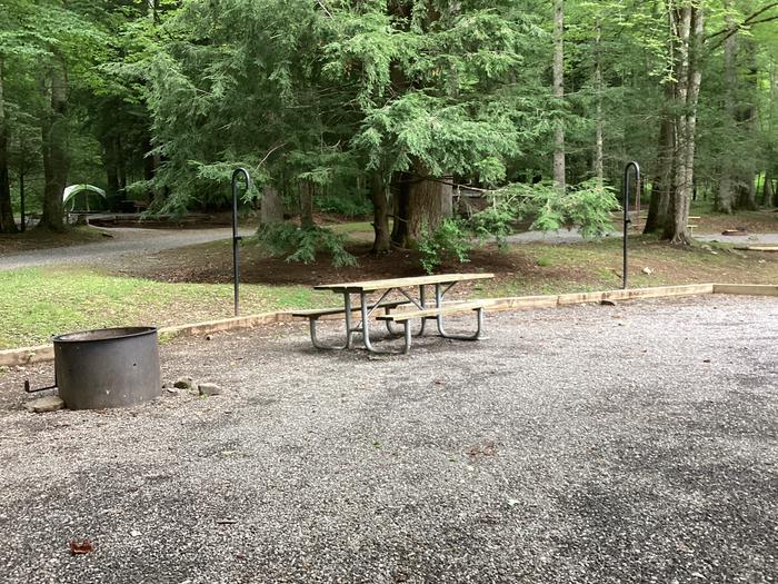 A photo of Site 034 of Loop Upper at BLACK MOUNTAIN CAMPGROUND with Picnic Table, Fire Pit, Shade, Lantern Pole