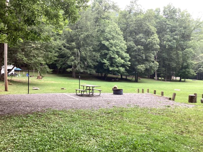 A photo of Site 041 of Loop Upper at BLACK MOUNTAIN CAMPGROUND with Picnic Table, Fire Pit, Lantern Pole