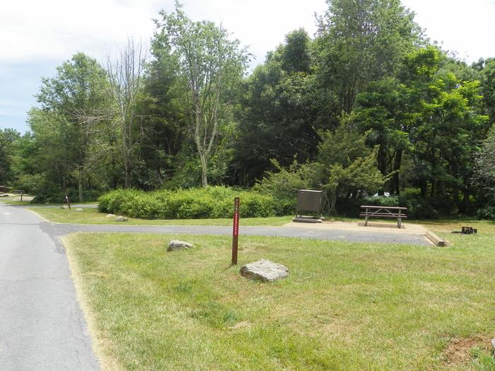 Campsite C126 has a driveway, picnic table, fire ring, tent pad, and food storage box.