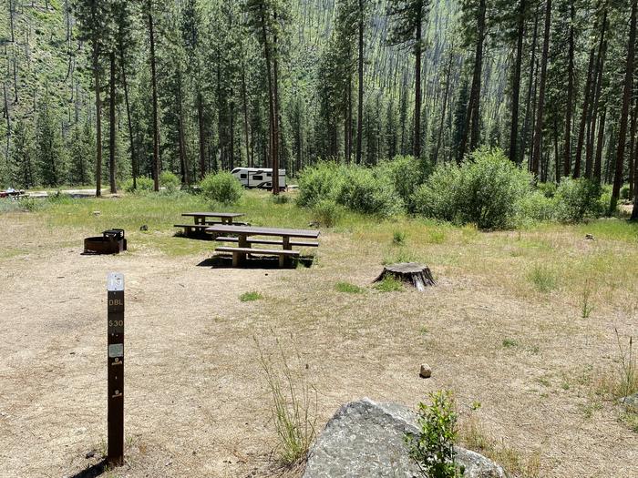 Campsite, tables and site post shownCampsite tables and fire ring 