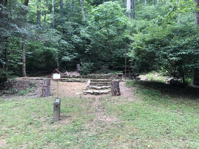 A photo of Site 038 of Loop B at CAVE MOUNTAIN LAKE FAMILY CAMP with Shade, Tent Pad