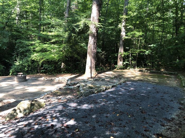 A photo of Site 032 of Loop B at CAVE MOUNTAIN LAKE FAMILY CAMP with Shade, Tent Pad