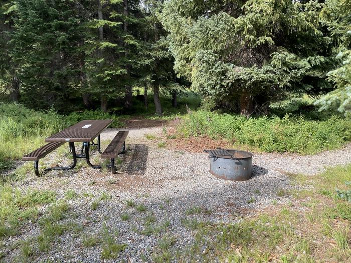 A photo of Site 26 at Deep Lake Campground with Picnic Table, Fire Pit, Shade, Tent Pad.