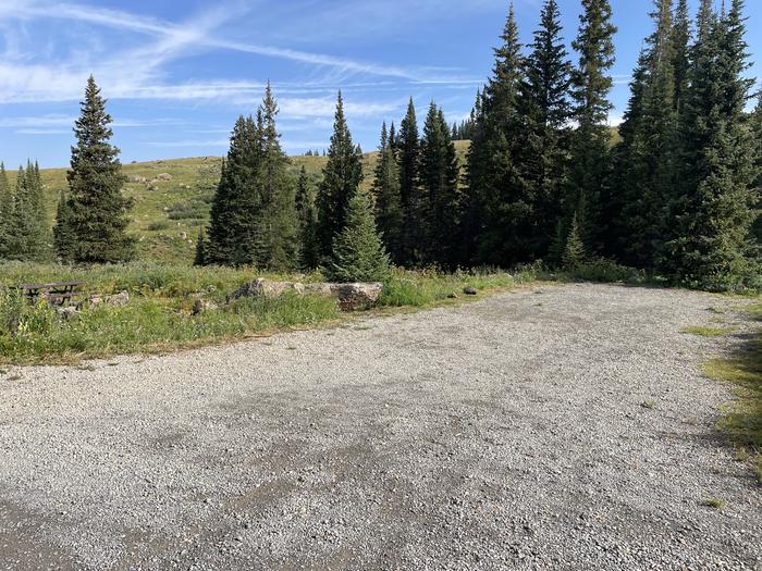 A photo of Site 18 at Deep Lake Campground with Picnic Table.