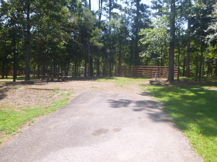 A photo of Site E014 of Loop HCLE at CEDAR LAKE (OKLAHOMA) with Picnic Table, Electricity Hookup, Fire Pit, Shade, Lantern Pole, Water Hookup