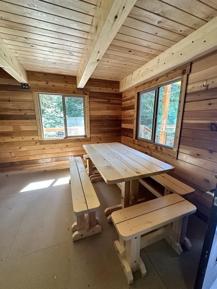 Interior with tableAnan Bay Cabin interior table