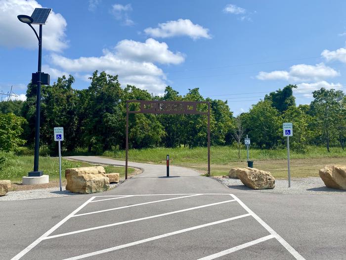 Unique to Keystone Lake, a mile long fitness trail located in Brush Creek offers obstacles. Featured is the entrance to the trail. A photo of fitness trail facility Brush Creek Public Use Area