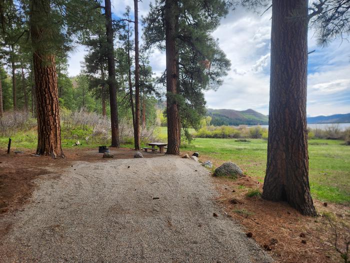 Site 4 parking spur with table and fire pit to rear