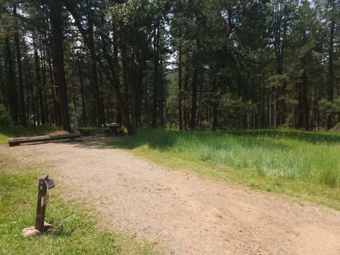 C5 back-in spur with picnic table and fire ring located behind site, good sun exposure on spur