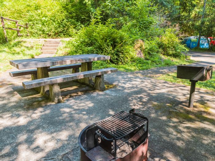 Picnic table, fire ring, BBQ grill and tent pad.Campsite #11 photo of the picnic table, fire ring, BBQ grill and tent pad.