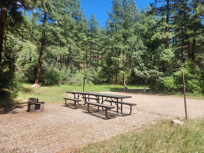 E8 two picnic tables, with fire pit