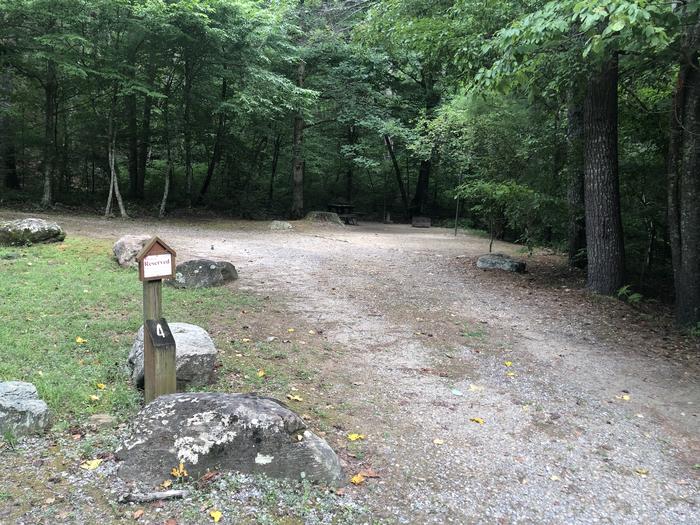 A photo of Site 004 of Loop CAVE MOUNTAIN LAKE FAMILY CAMP at CAVE MOUNTAIN LAKE FAMILY CAMP with Shade, Tent Pad