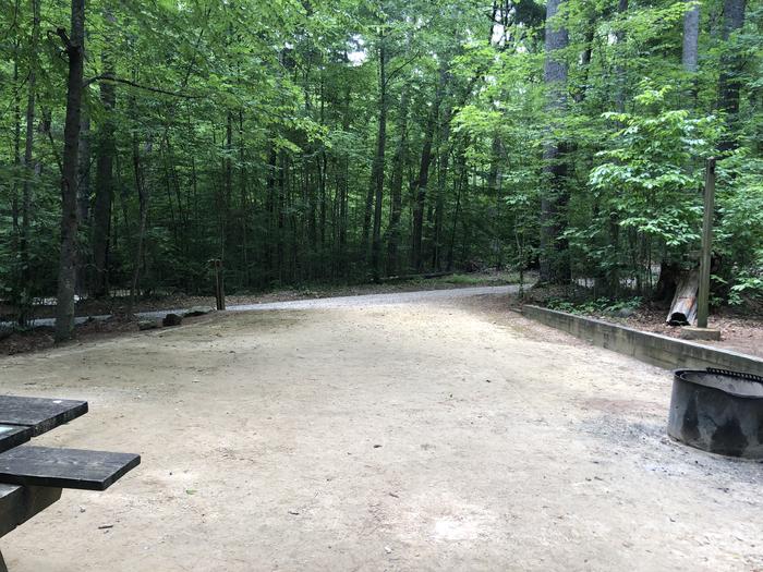 A photo of Site 033 of Loop B at CAVE MOUNTAIN LAKE FAMILY CAMP with Shade, Tent Pad