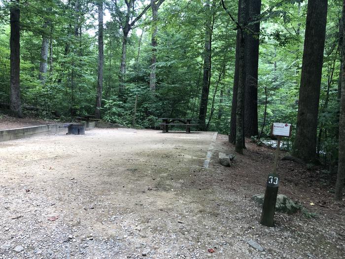 A photo of Site 033 of Loop B at CAVE MOUNTAIN LAKE FAMILY CAMP with Shade, Tent Pad