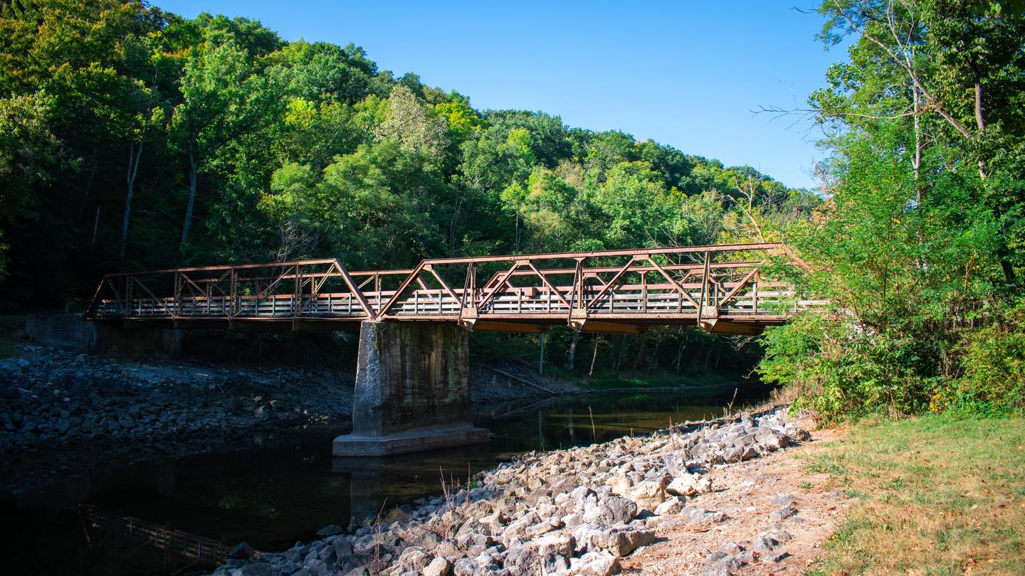 Steel bridge over green tailwater outflowCaesar Creek Lake tailwater bridge