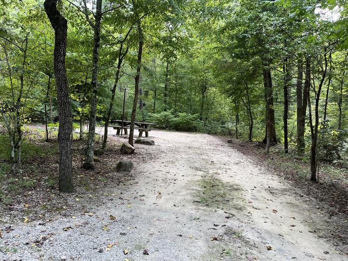 A photo of Site 026 of Loop CAVE MOUNTAIN LAKE FAMILY CAMP at CAVE MOUNTAIN LAKE FAMILY CAMP with Shade, Tent Pad