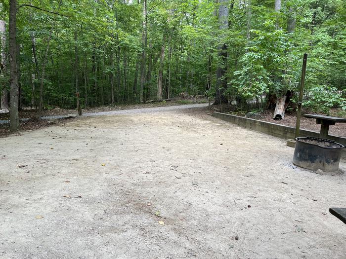 A photo of Site 033 of Loop B at CAVE MOUNTAIN LAKE FAMILY CAMP with Shade, Tent Pad