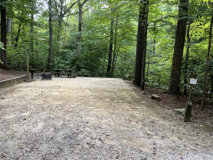 A photo of Site 033 of Loop B at CAVE MOUNTAIN LAKE FAMILY CAMP with Shade, Tent Pad