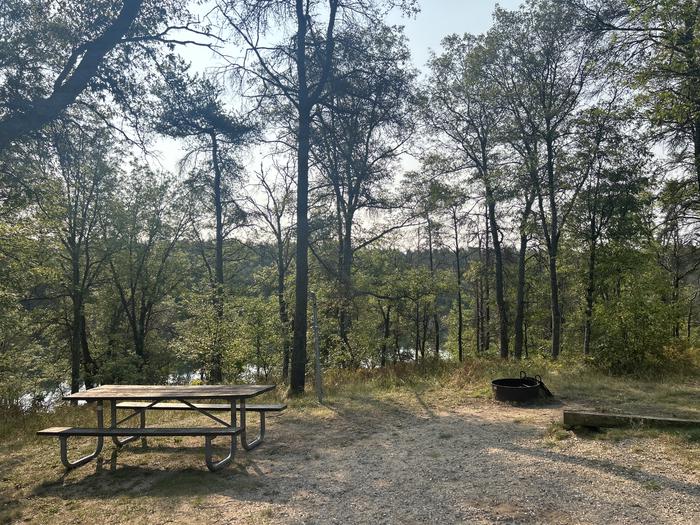 A photo of Site 12 of Loop Lower at Kneff Lake Campground with Picnic Table, Fire Pit, Lantern Pole