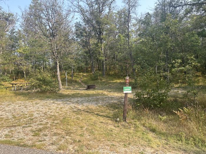 A photo of Site 18 of Loop Lower at Kneff Lake Campground with Picnic Table, Fire Pit, Lantern Pole