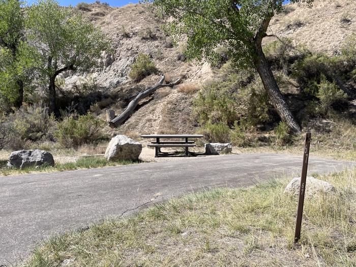 A photo of Site 67 of Loop C at GREEN RIVER CAMPGROUND with Picnic Table, Fire Pit