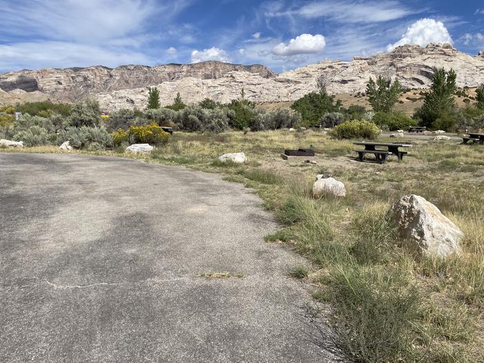 A photo of Site 12 of Loop A at GREEN RIVER CAMPGROUND with Picnic Table, Fire Pit